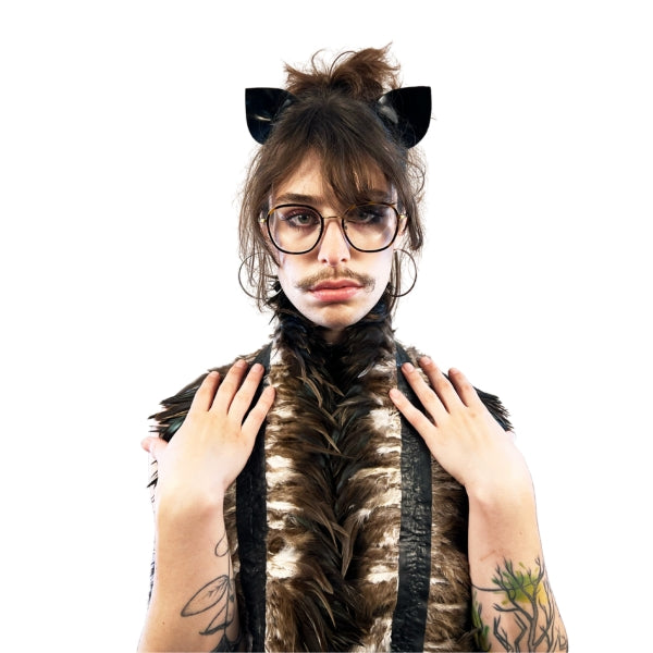 Close up of a model wearing the brown latex feather boa draped around their shoulders.