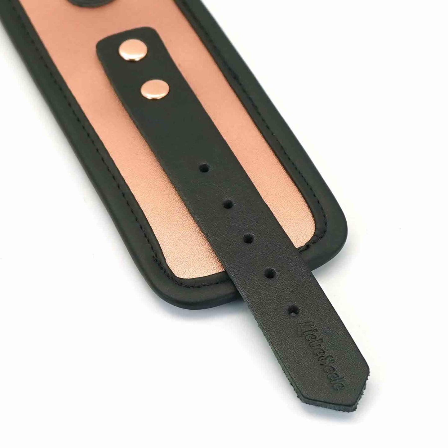 A close up of the strap on the Rose Gold Memory Leather Cuffs with Faux Fur LIning.