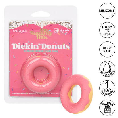 The Dickin Donuts Silicone Cock Ring next to its packaging.