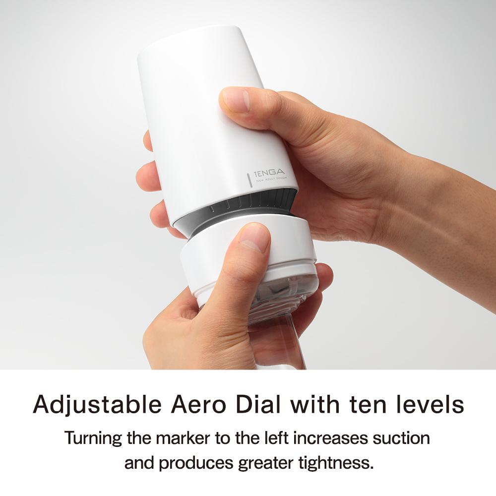Two hands holding the Tenga Aero Stroker showing how to turn the dials to tighten it.