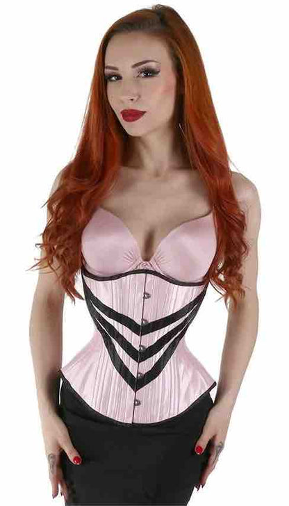 A model wearing the PInk Silk Triple V Mid-Length Underbust Corset - in Hourglass Silhouette over a pink bra and black skirt, front view.
