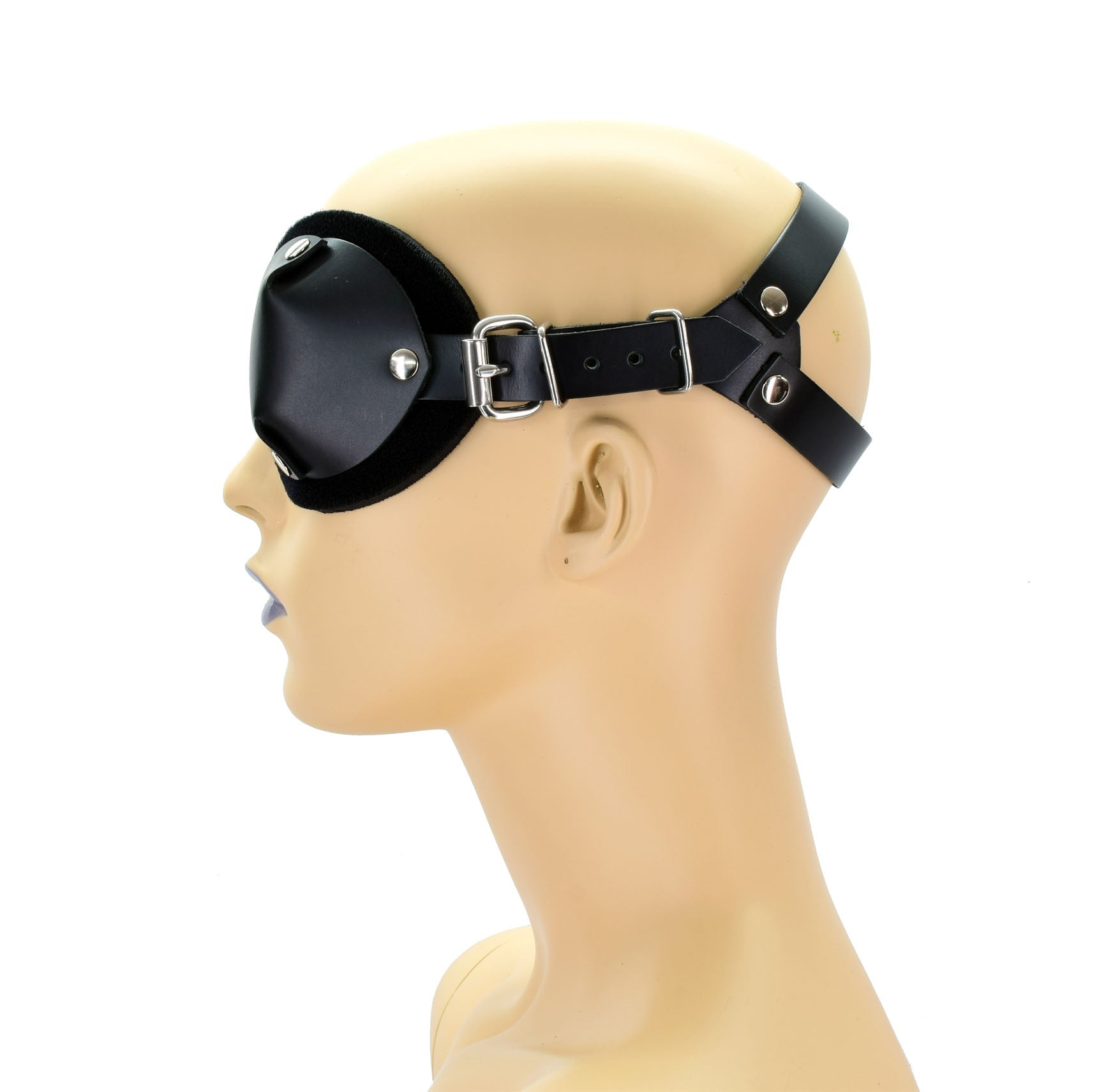 A mannequin head displaying the leather Ultimate Blindfold, left side view.