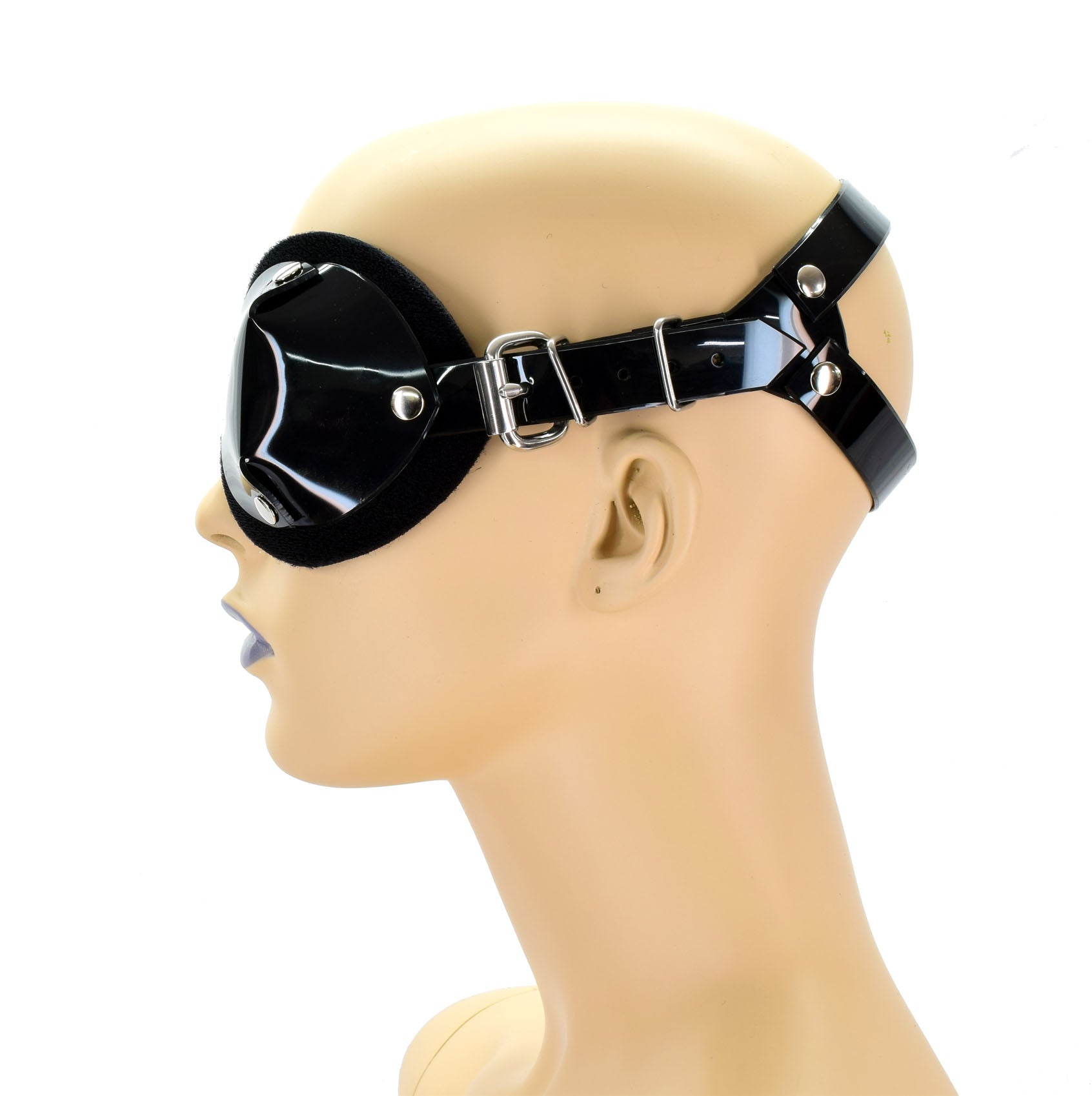 The PVC Ultimate Blindfold on a mannequin head, left side view.