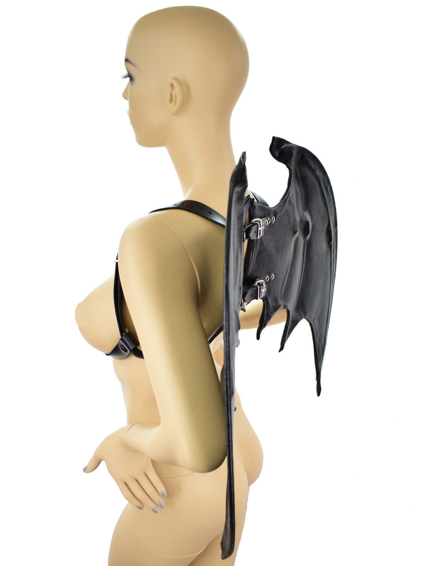 The Leather Bat Wings on a mannequin, side view.