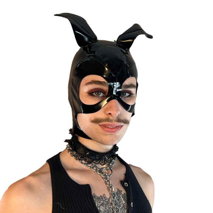 A model wearing black with magnetic ears open mouth and eye basic latex hood, front view.