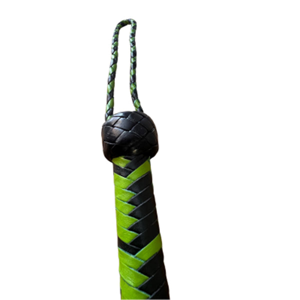 A close up of the handle of Spring Green and Black Braided Singletail Whip.