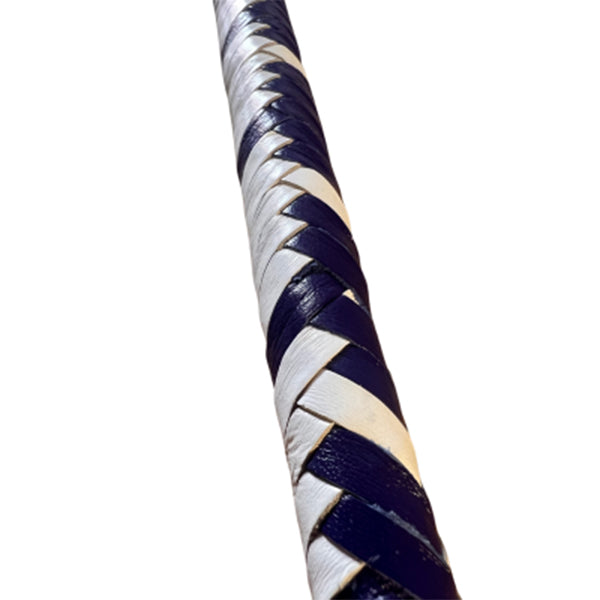 A close up of the body of the White and Purple braided Singletail Whip.