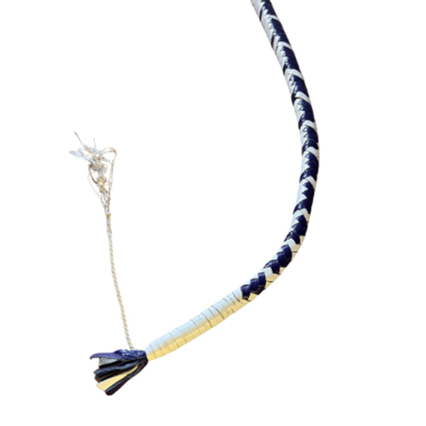 A close up of the tail of white and purple single tail whip.