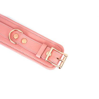 Pink Leather Wrist Cuffs Close Up View on Buckle 