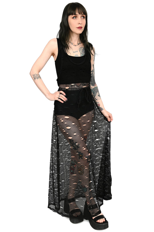 A model wearing the Jax Fishnet Maxi Dress, front view.