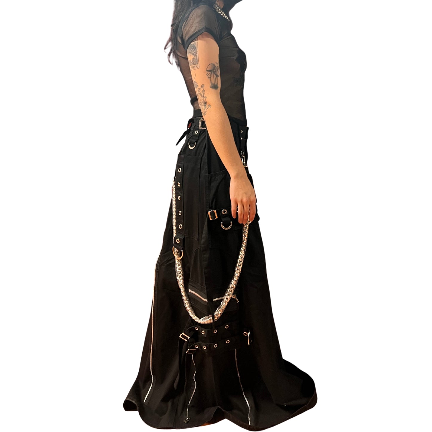 right side of Strength Maxi Kilt, and black fishnet t-shirt on model