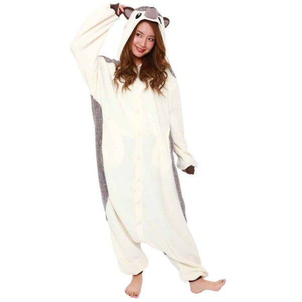 Model wearing hedge hog kigurumi holding its right ear.