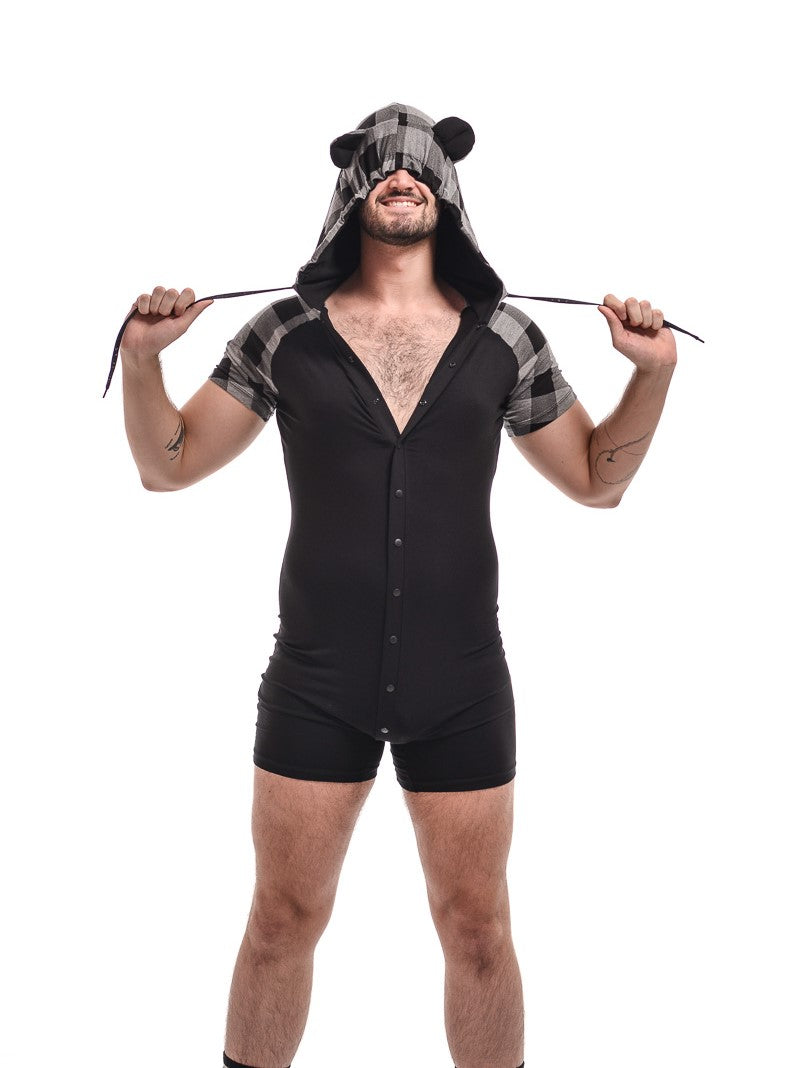 A model showing the front of the grey with black Bear Plaid Bamboo Onesie with hoodie up and the model's hands pulling the hood's draw strings.