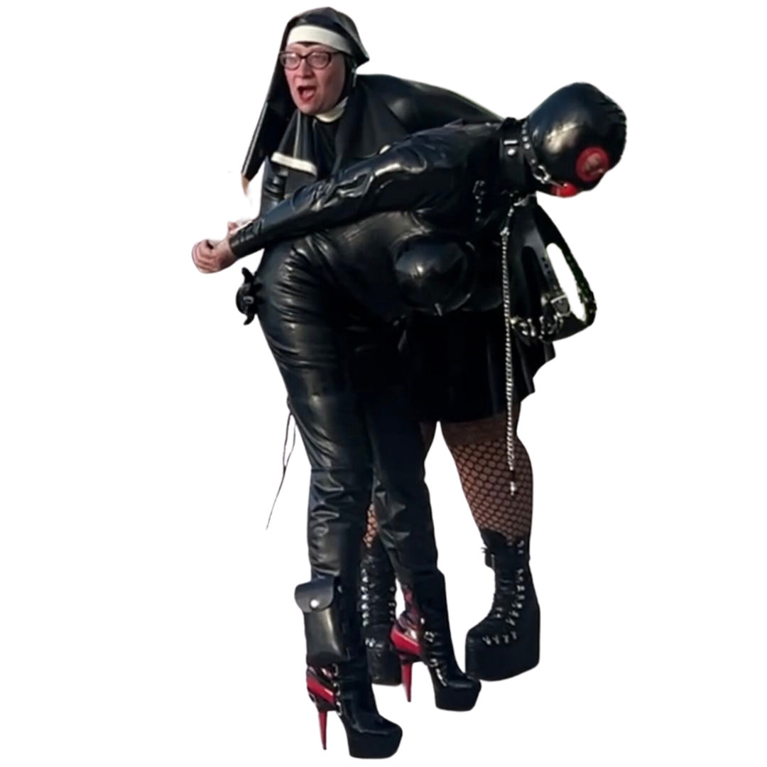 model wearing Inflatable Torpedo Tatas Latex Bra bent over being spanked