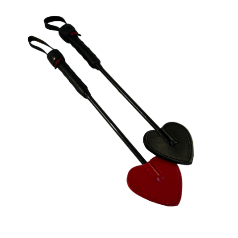Black and a Red Rouge leather mini heart paddles side by side.