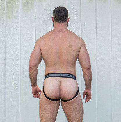 A model wearing the Gruff Pup Daddy Air Jock with Bulge Boost, rear view.