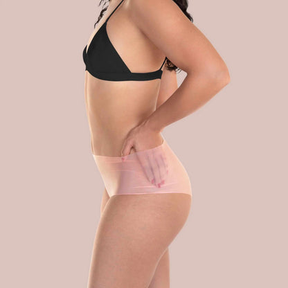 A model wearing the sheer peach shortie Lorals Panties For Pleasure and Comfort, side view.
