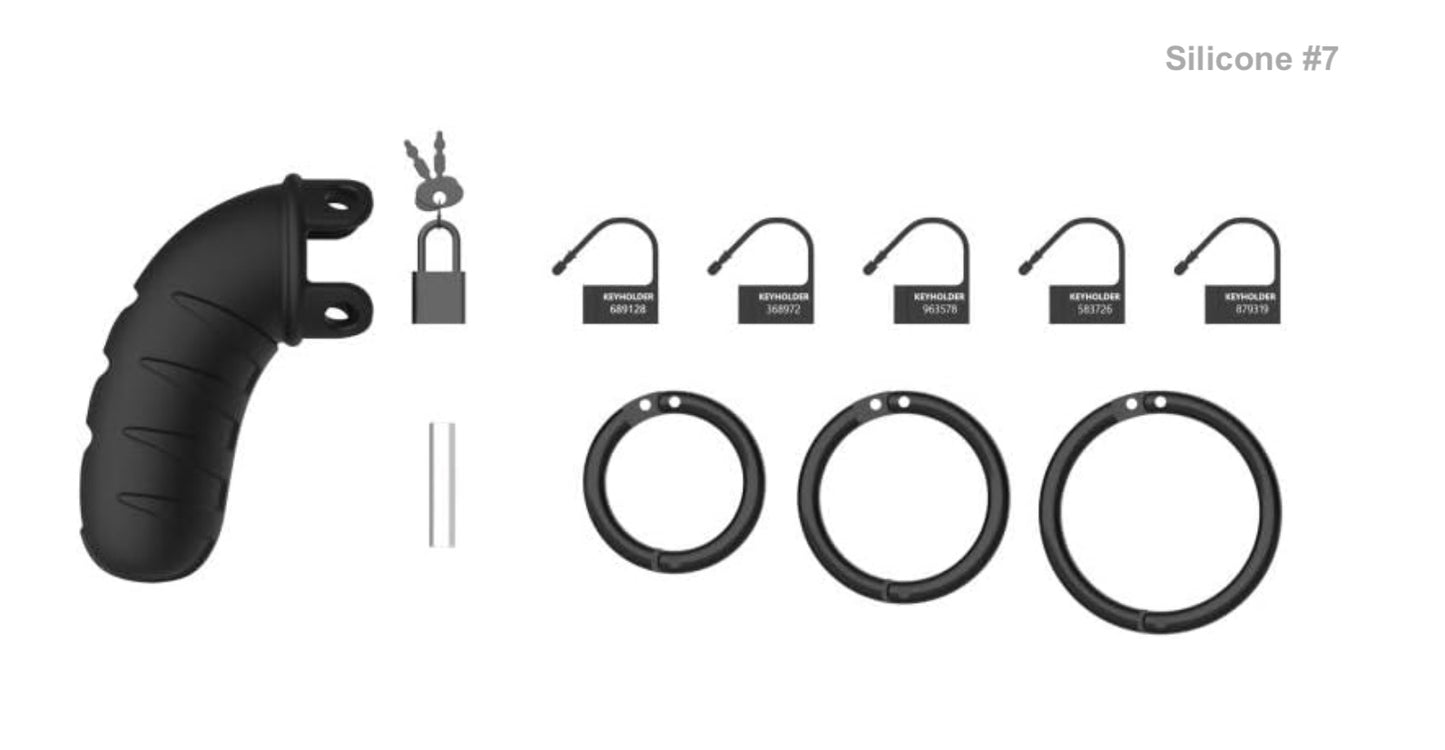 The black silicone Mancage Chastity Device model #7 with all of its attachments.