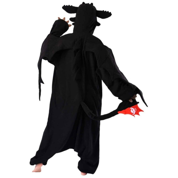 Model wearing Toothless Dragon holding tail, rear view.