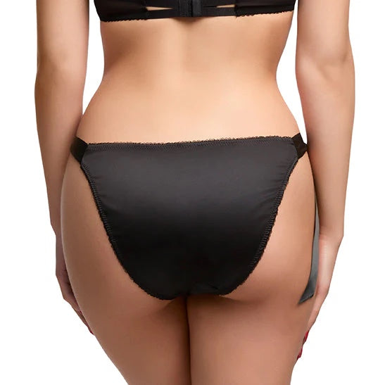 A model wearing the Beau Teese Tie-side Tanga Panty, rear view.