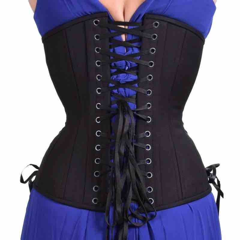 A model wearing the Black Cotton Cashmere Longline Underbust Corset - Hourglass over a dark blue dress, rear view.