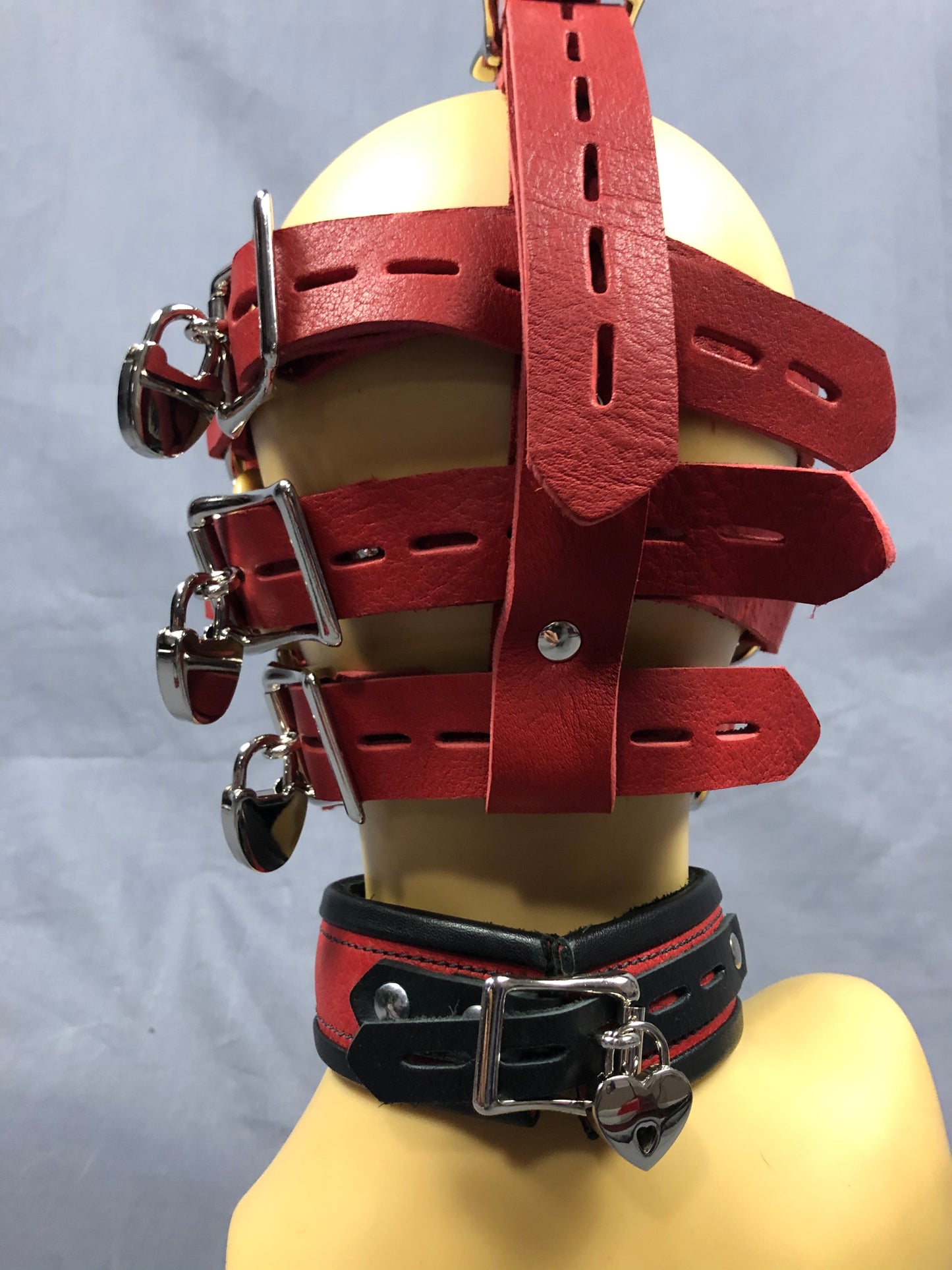 Back view of red bullhide head harness with locks on.