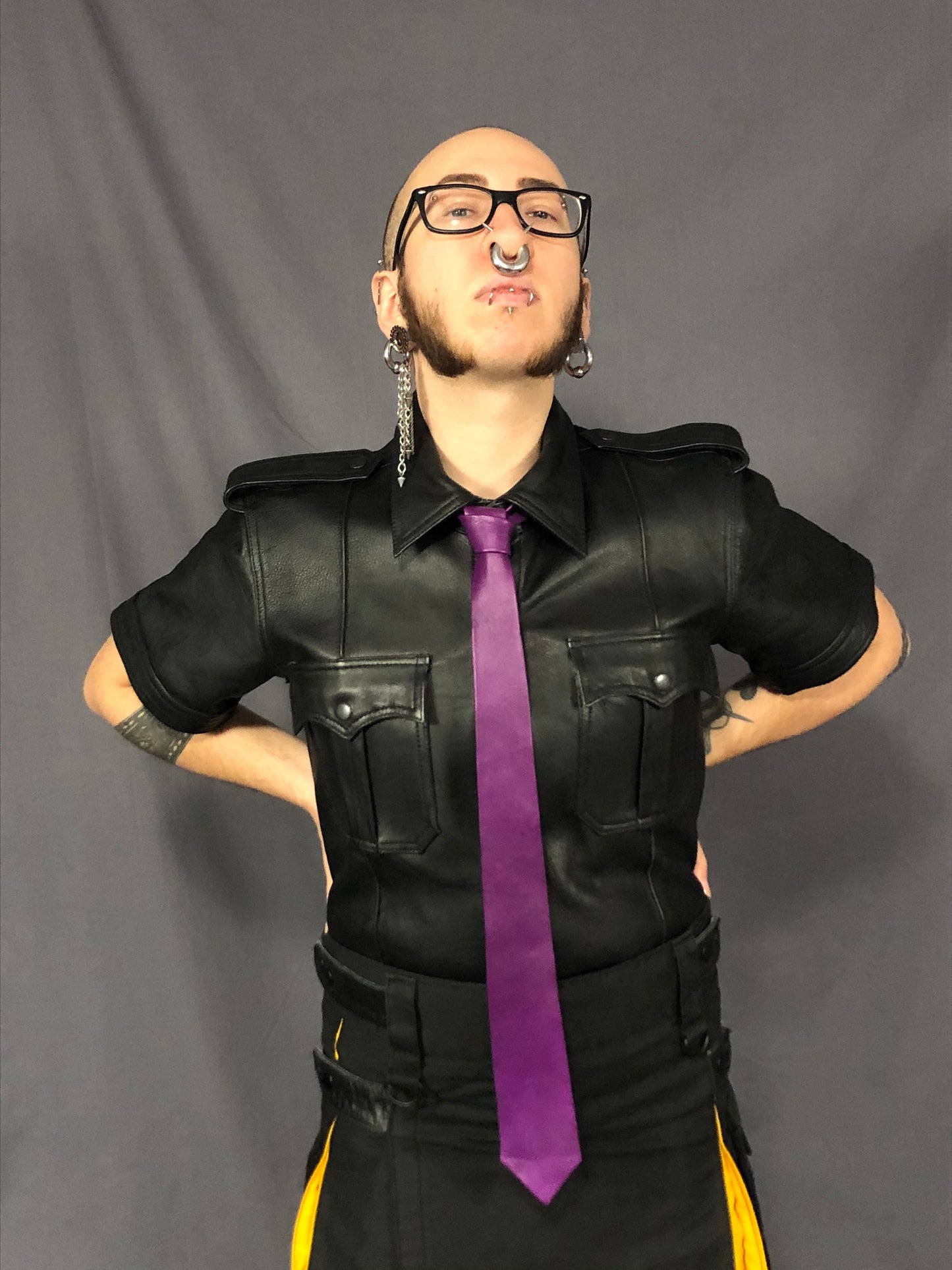 Purple leather necktie.