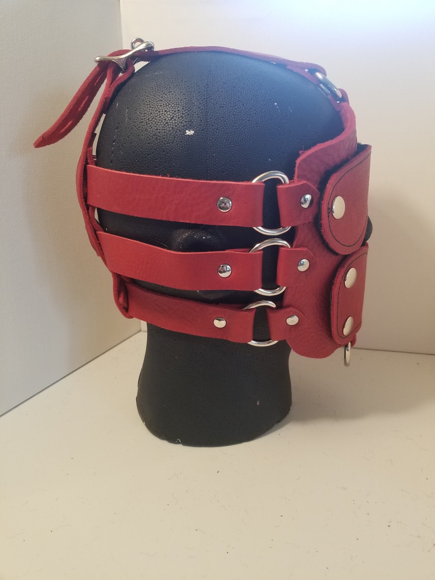 The red Bullhide Head Harness, side detail.