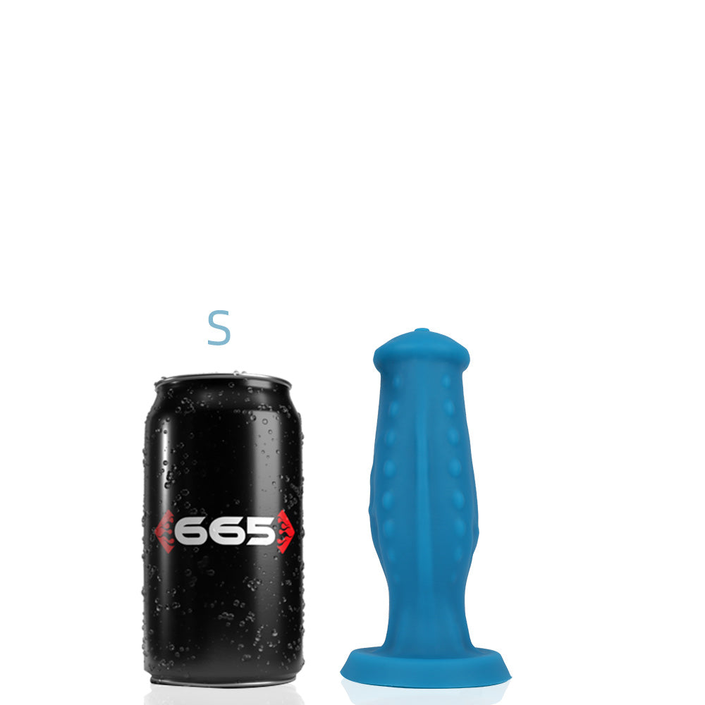 The small Jake Liquid Silicone Dildo next to a soda can for size comparison.