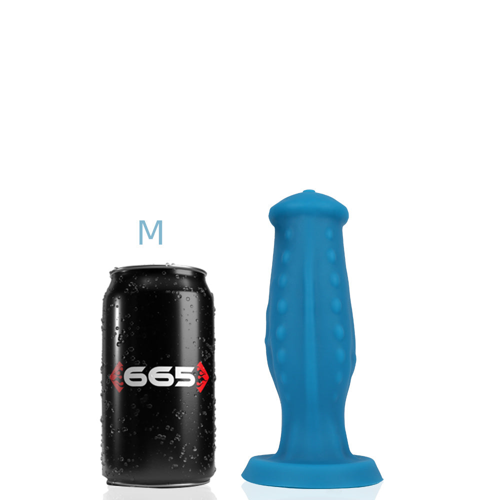 The medium Jake Liquid Silicone Dildo next to a soda can for size comparison.