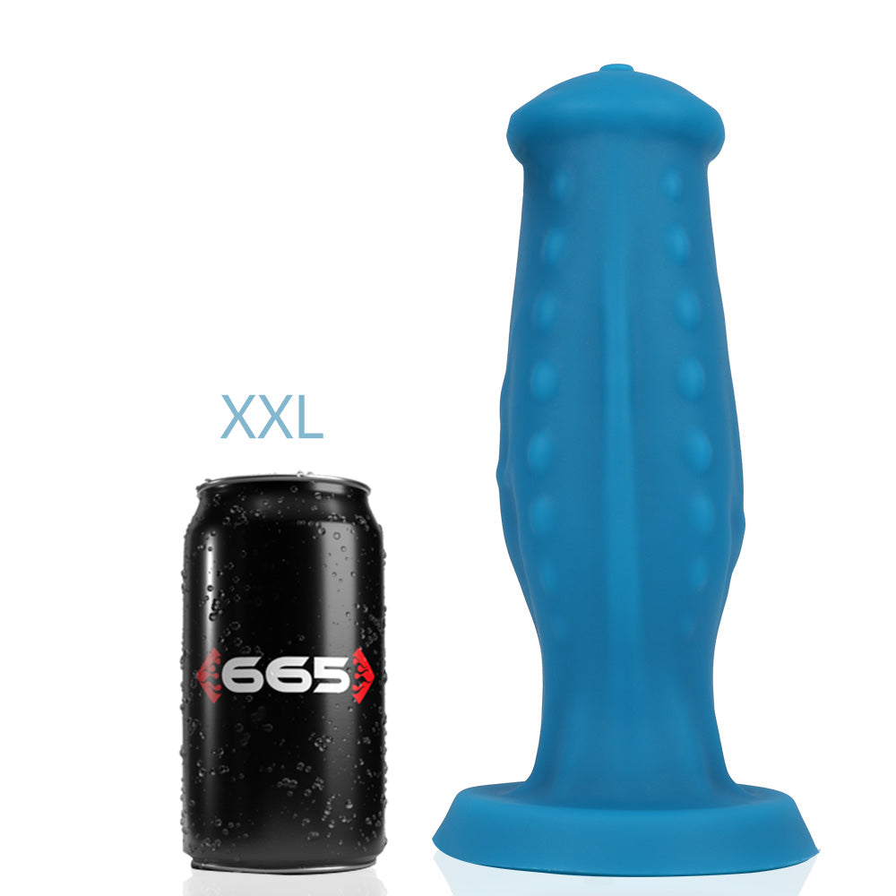 The 2XL Jake Liquid Silicone Dildo next to a soda can for size comparison.