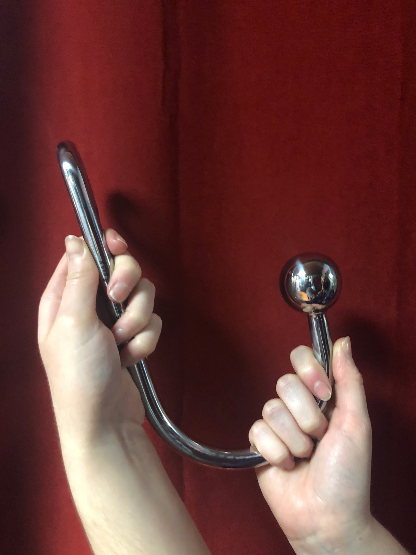 Medium single ball with turnout loop anal hook.