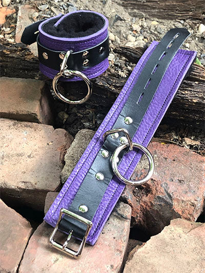 Purple basic fleece wrist cuffs, one cuff buckle , one cuff laid out flat