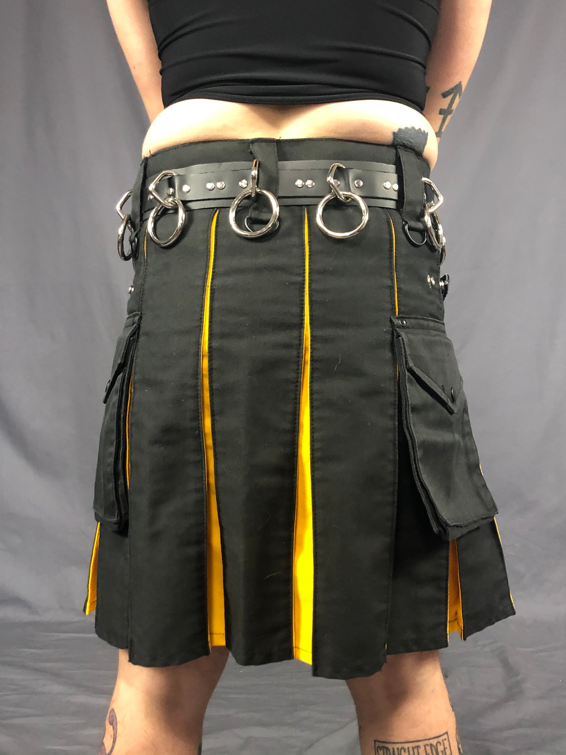 back close up view of strapped bondage belt