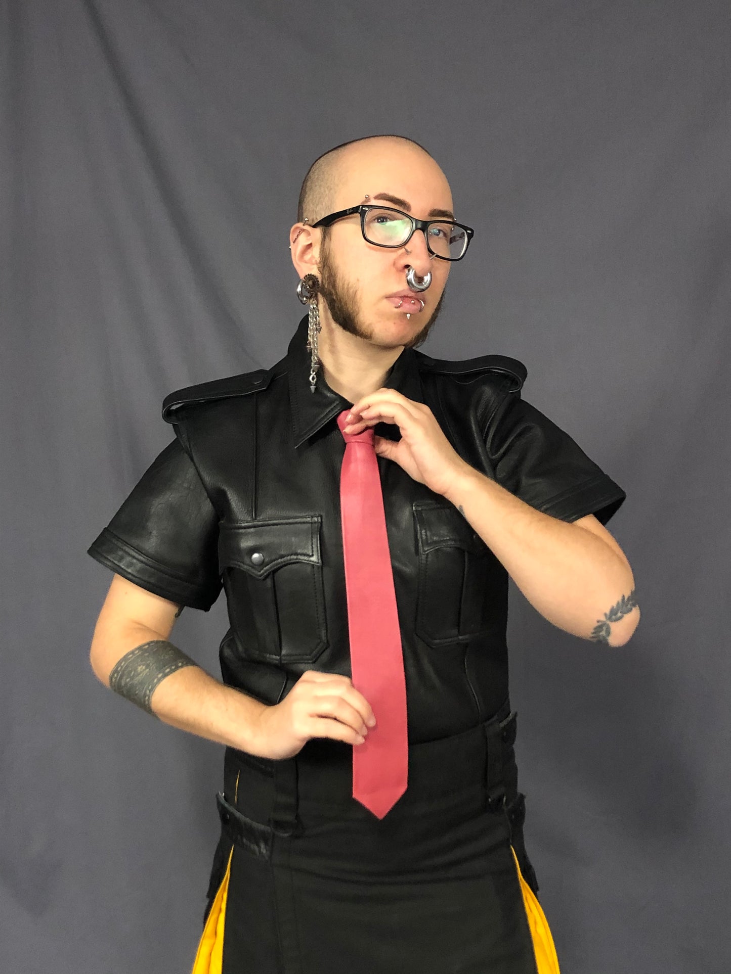 Pink leather necktie.