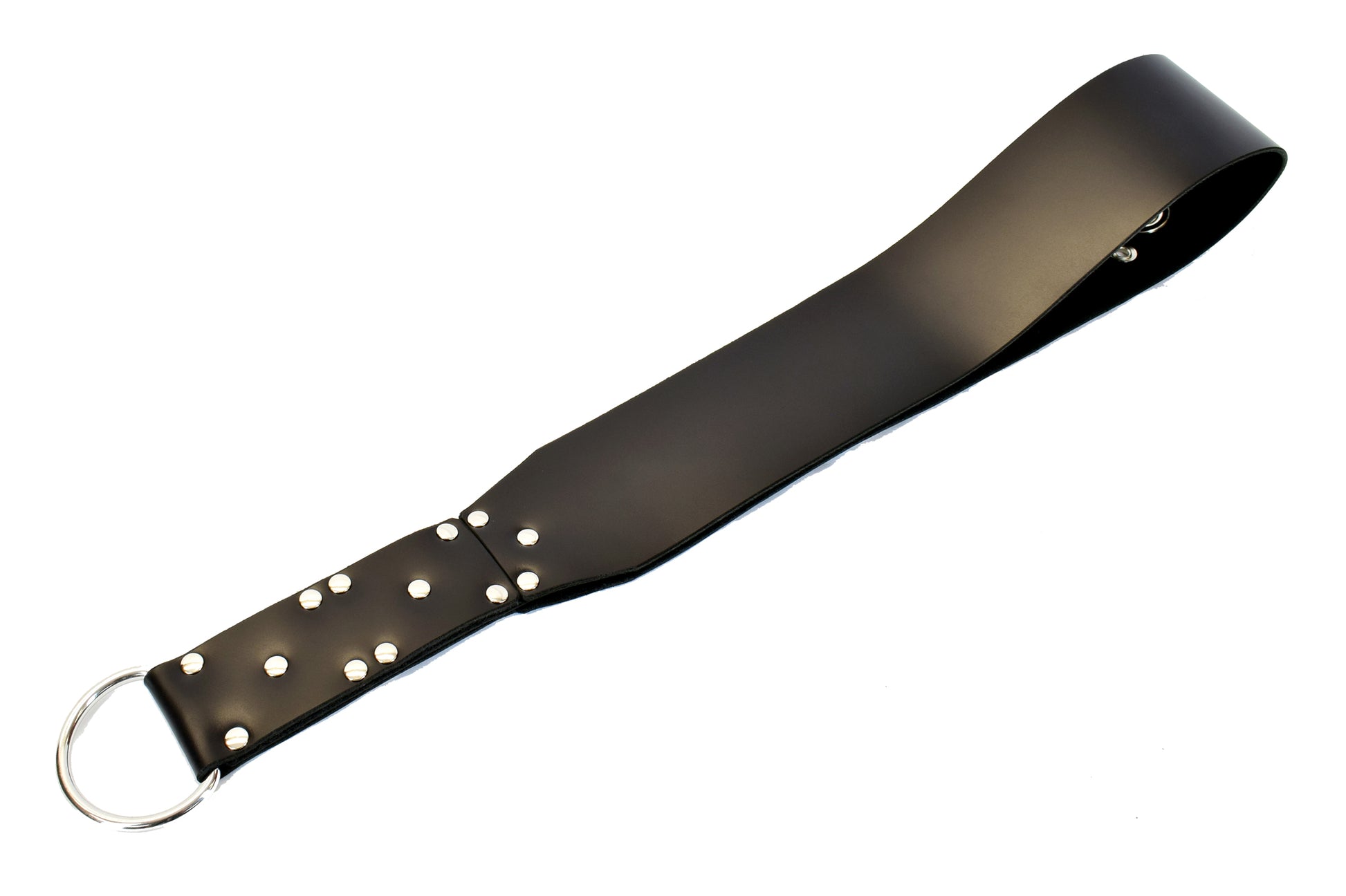 Black big leather slapper strap laid straight out on reverse side without tentacle detailing, against white background.