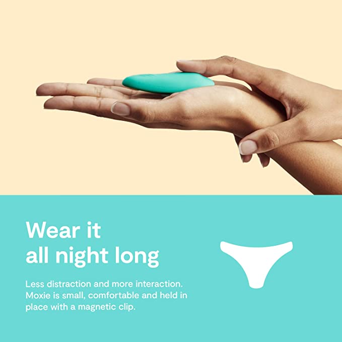 A handing holding the We-Vibe Moxie+ Wearable Clitoral Vibrator with a caption that says, "Wear it all night long, Less distractions and more interaction Moxie is small, comfortable and held in place with a magnetic clip".