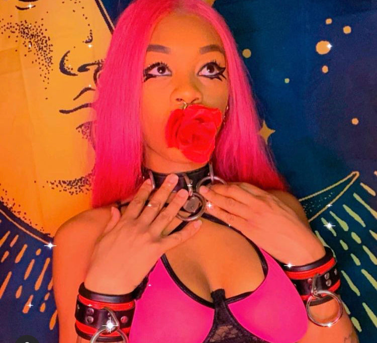 A model earing the Zalo Rose Ball Gag.