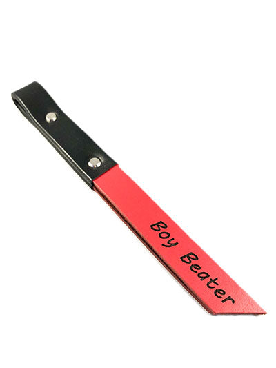 Red 1 inch leather slapper with the words boy beater printed on the body.