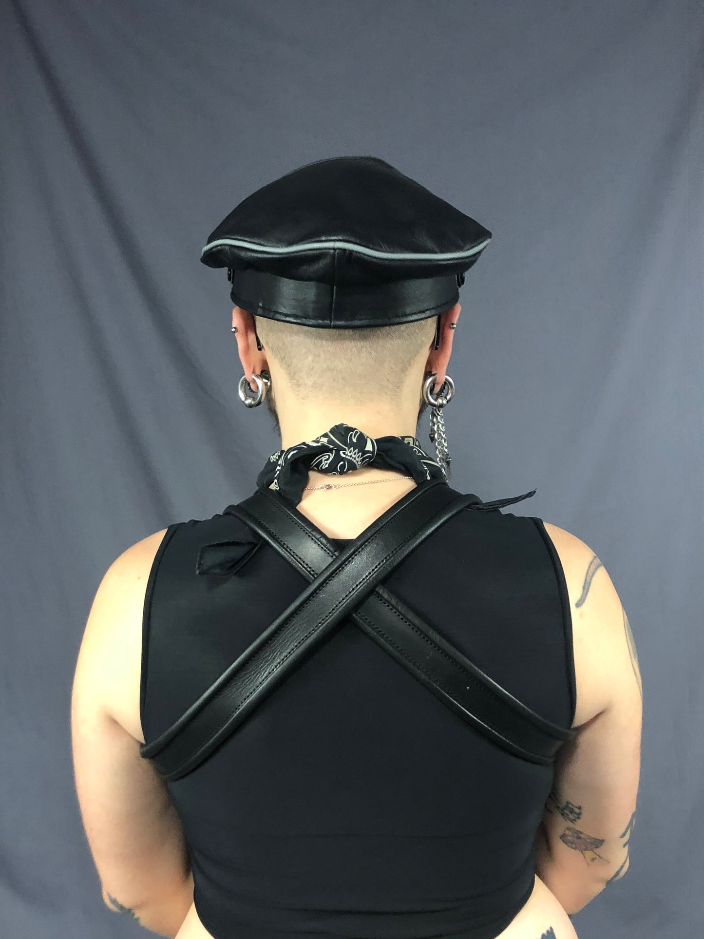 Back view of black/grey prowler leather military cap.