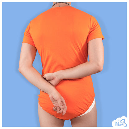 Rear view of model wearing orange diapersuit with disposable diaper worn underneath