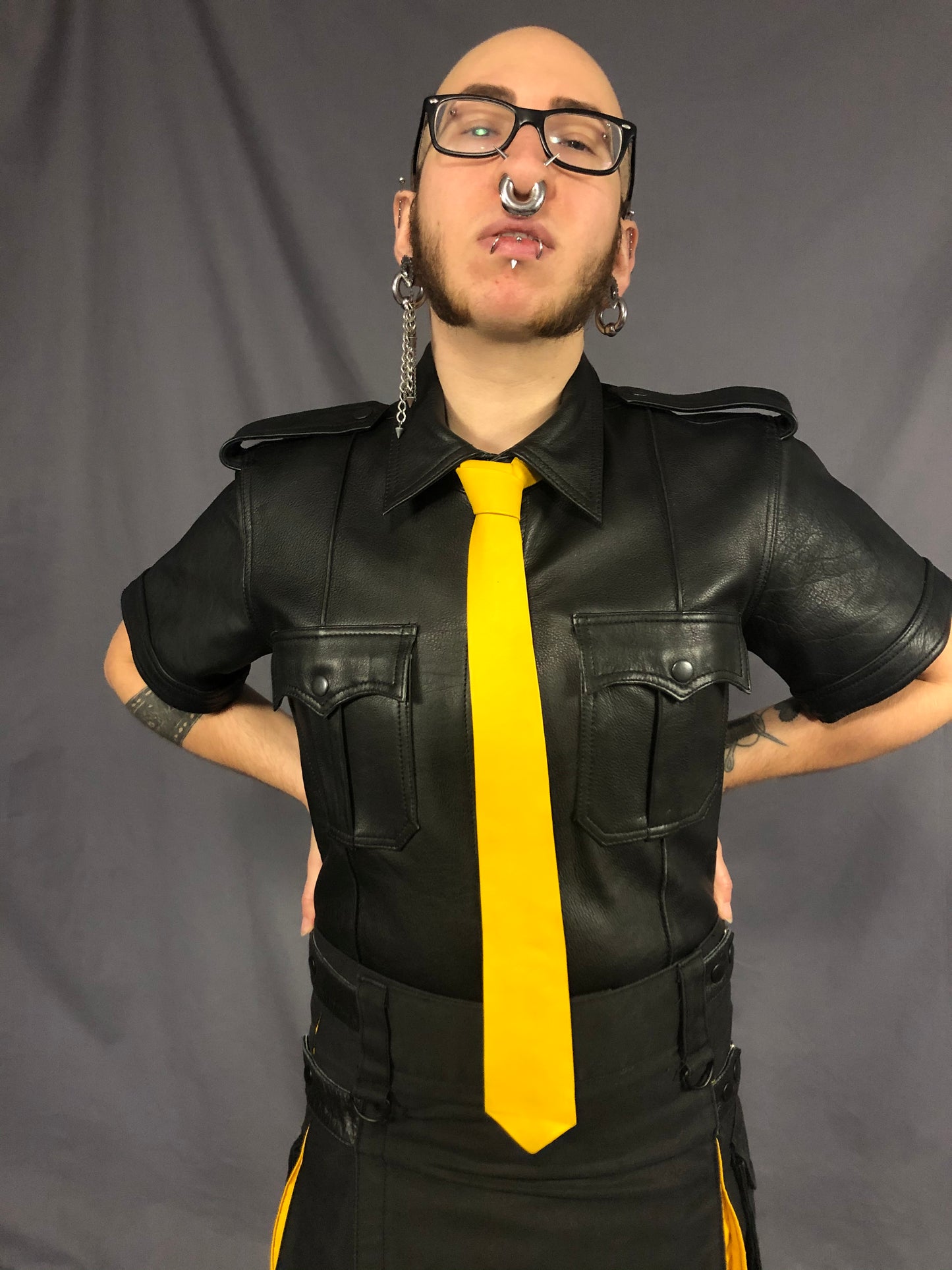 Yellow leather necktie.