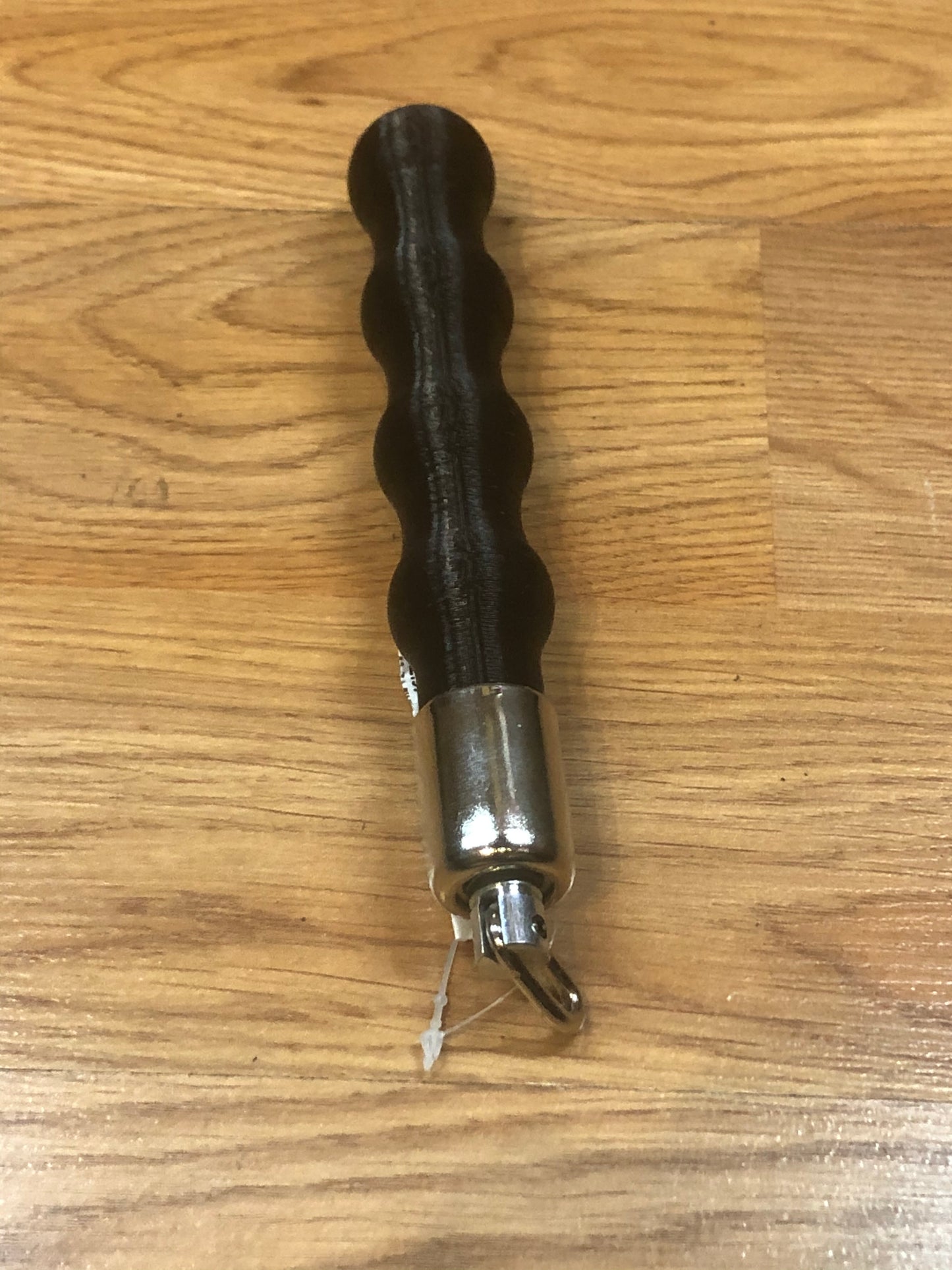 The hook end of the Flogger Handle.
