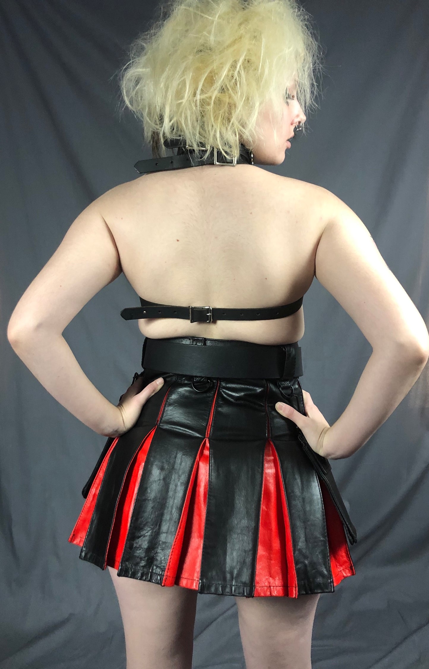 Black and Red Mini Cowhide Contrast Pleat Kilt, rear view.