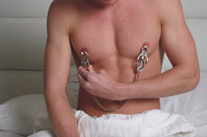 A model wearing the Butterfly Clamps With Chain.
