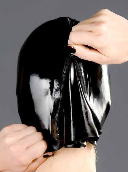 Rear of model in the black Latex Hood with Nose Holes, unzipped.