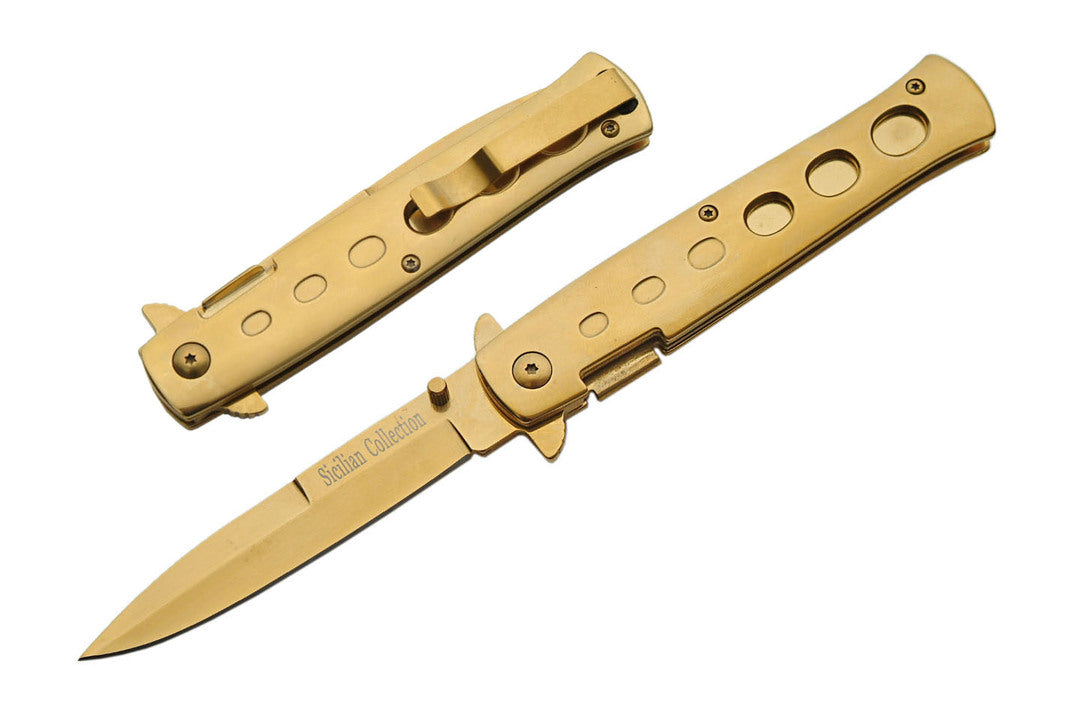 Two gold Stiletto Type Folding Knives, one in the open position, and one in the closed position.