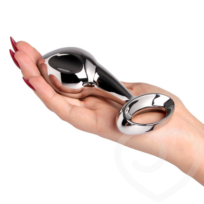 Pure Steel Anal Plug lying in model's hand