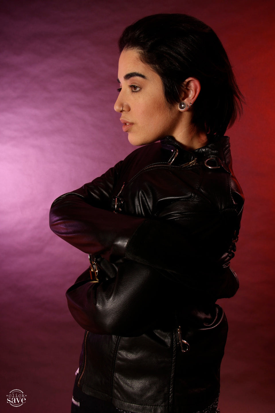 A model displaying the left side of the Cowhide Strait / Jacket.