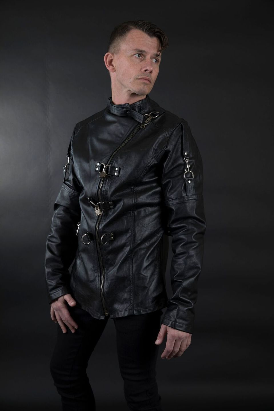 A model displaying the front of the Cowhide Strait / Jacket.